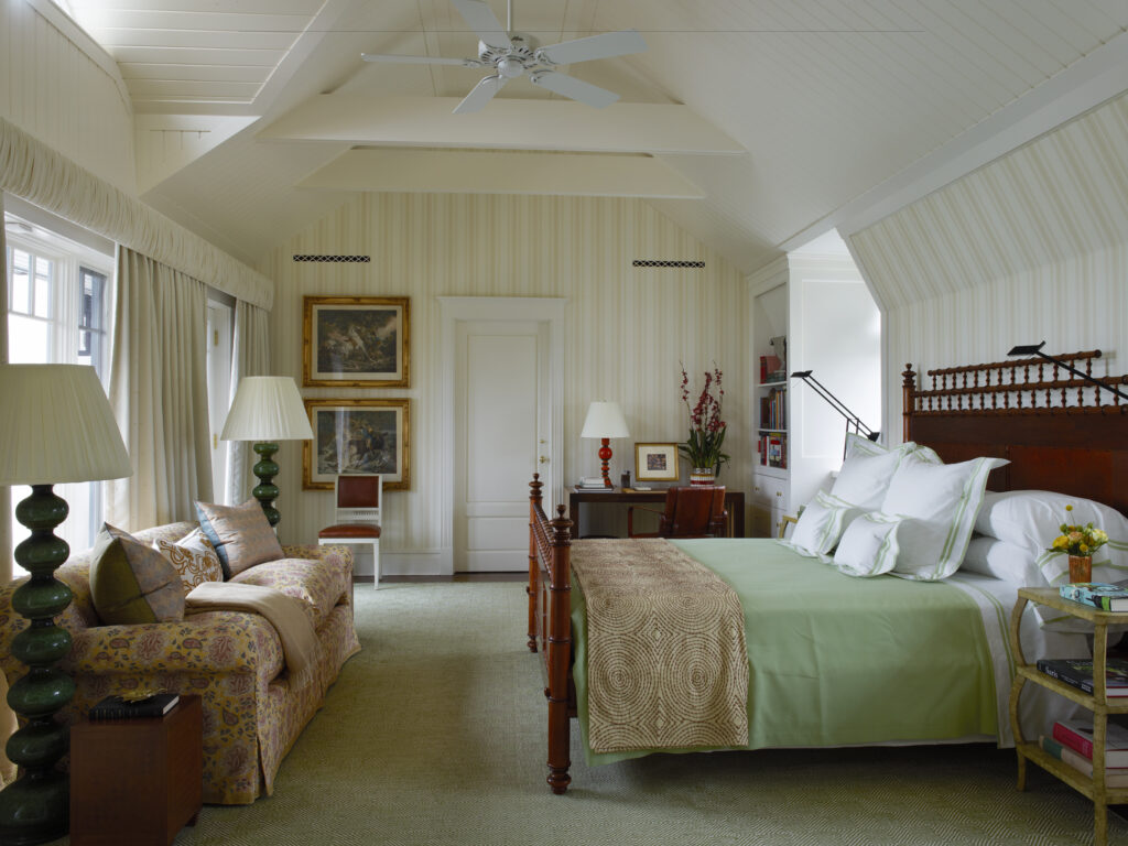 a bedroom by bunny williams interior design with a bamboo bed